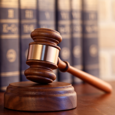 Photo of a gavel on a desk. 